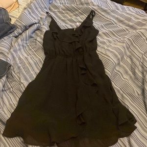 This a flowy elegant black dress . This is from H&M